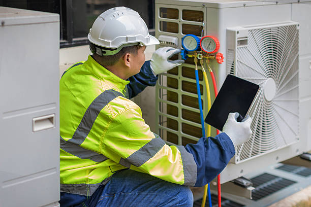 Professional Hvac technician working in Hudson, IL